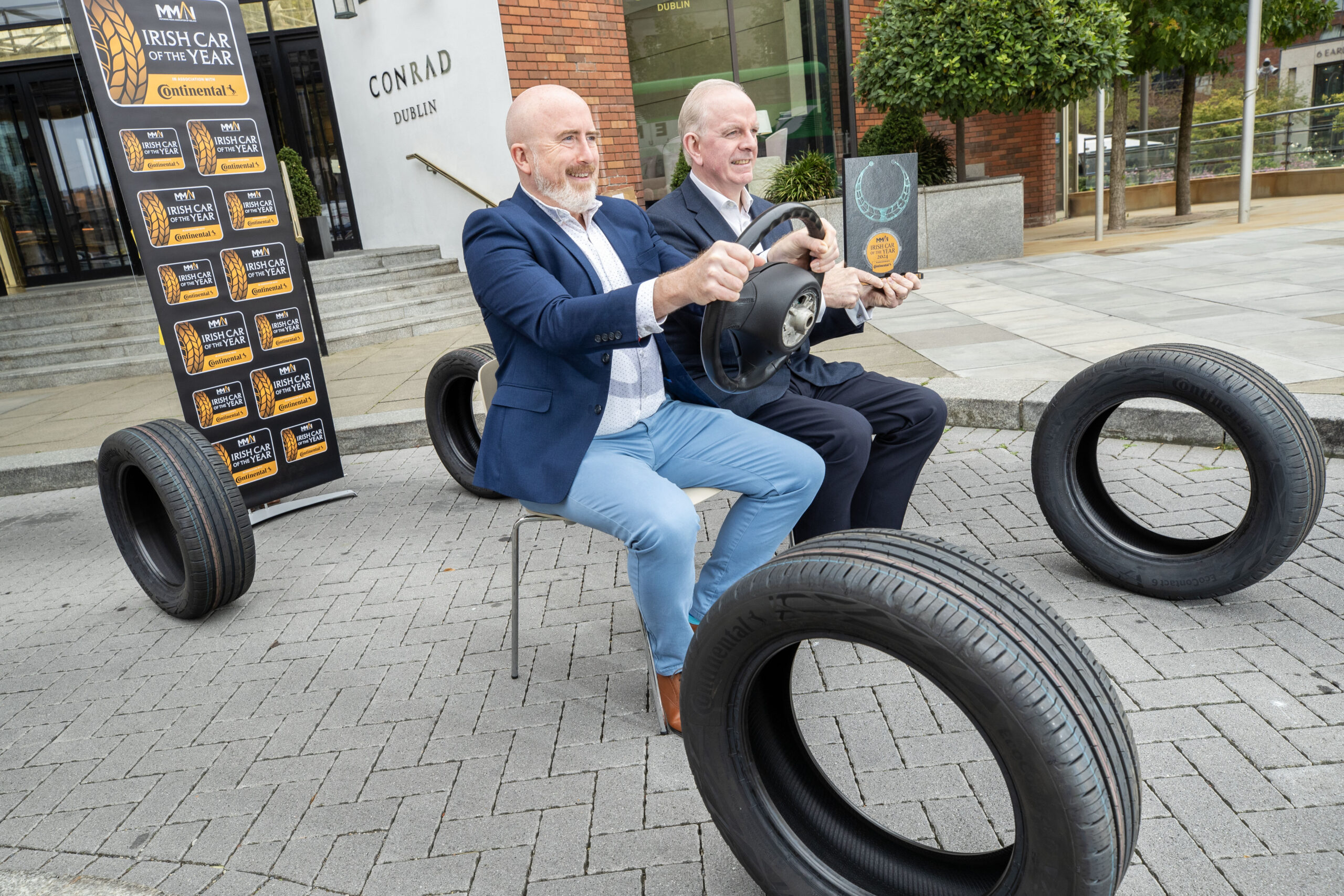 Daragh Keany, Chairman of the MMAI, with Tom Dennigan of Continental Tyres Ireland, at the launch of 2025 Irish Car of the Year